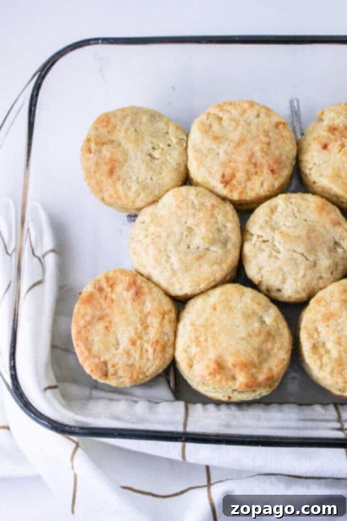 Hardees Copycat Biscuit Recipe 6 Hardee's biscuit recipe - A stack of golden brown, fluffy biscuits on a cooling rack.