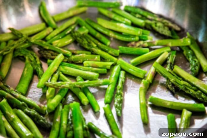 Perfect Pan-Fried Asparagus 5 pan asparagus cooking in a pan