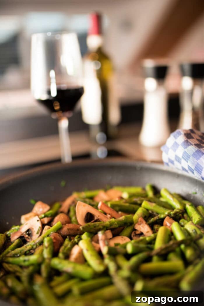 Perfect Pan-Fried Asparagus 7 asparagus cooked in a pan with mushrooms