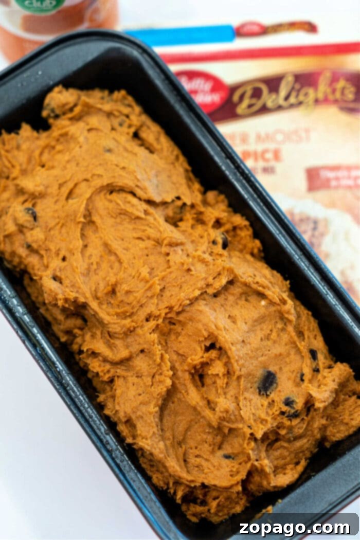 Spice Cake Mix Pumpkin Bread 5 A freshly baked loaf of Quick Bread Using Spice Cake Mix, perfectly golden.