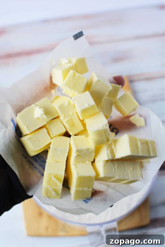 The Secret to Irresistible Homemade Biscuits 4 Homemade Biscuits with Buttermilk, showing close-up of flaky texture.