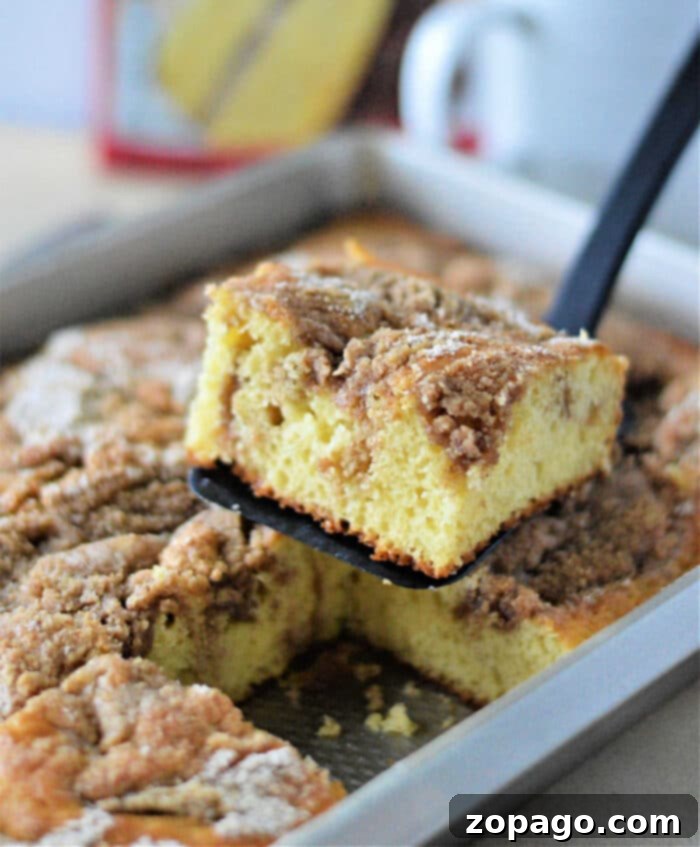 Easy Coffee Cake from Yellow Cake Mix 7 betty crocker cake mix coffee cake on a cooling rack.