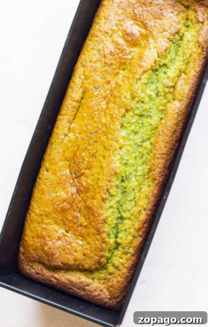 Green Goddess Cake 5 A loaf of homemade avocado bread shares the spotlight with its new cousin, avocado cake, in a rectangular baking pan.