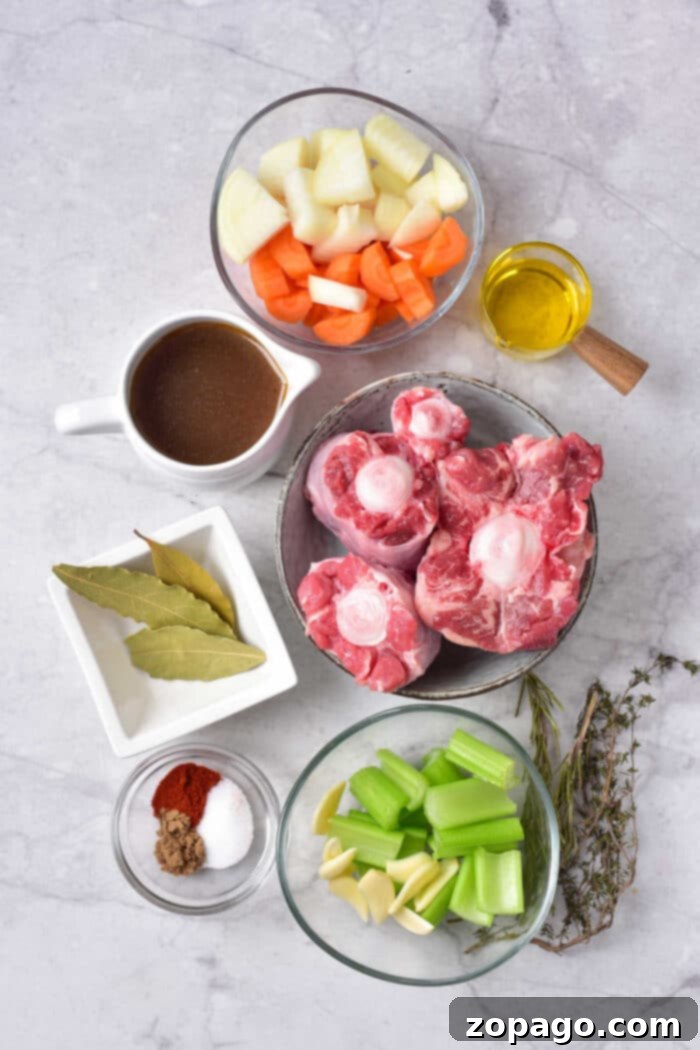 Slow-Cooked Oxtail Perfection 3 Oxtail Braised Recipe: A close-up of slow-cooked oxtail pieces in a savoury broth, ready to be served.