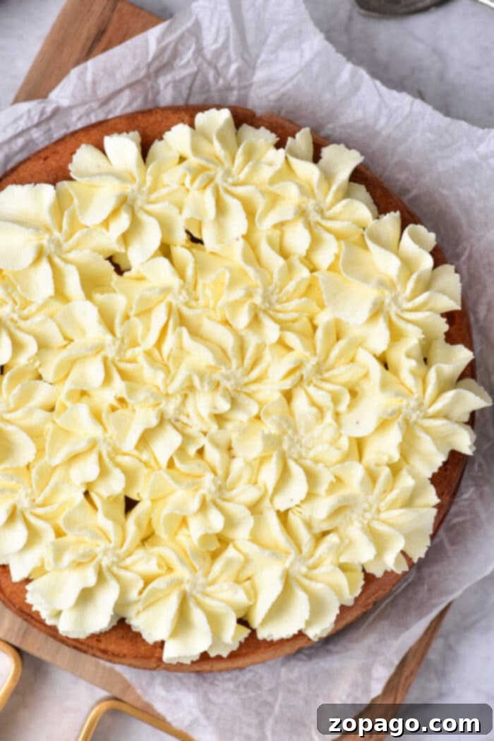 Luscious Lemon Curd Cake 4 Beautifully frosted Lemon Curd Cake, ready to be served.