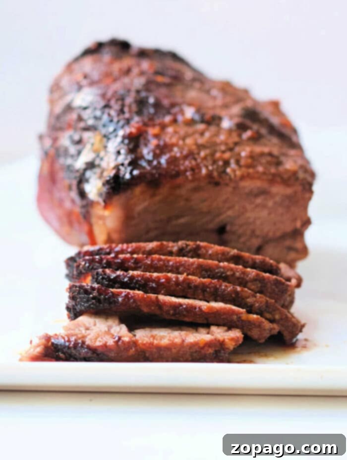 Crispy Air Fryer Frozen Roast 2 Air Fryer Frozen Roast Beef cooking in an air fryer basket, a perfect solution for quick and easy frozen meals.
