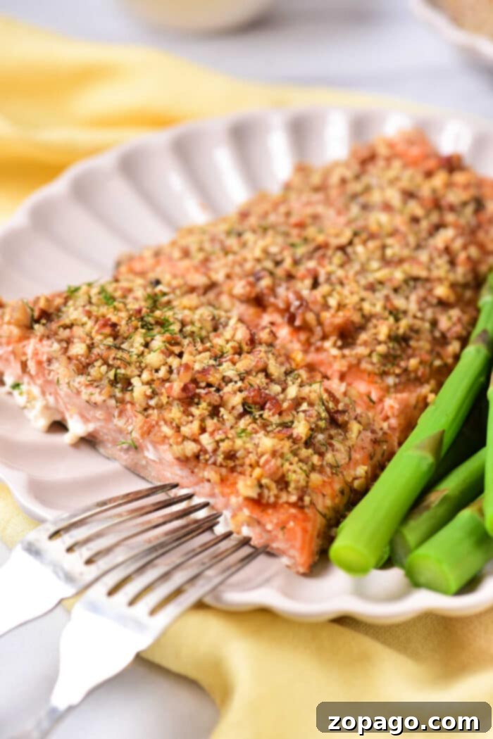 Crispy Almond Salmon 6 Salmon fillets with almond crust, served on a plate