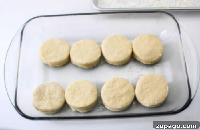 A close-up of Crisco biscuit dough being prepared, highlighting its textured appearance before baking.