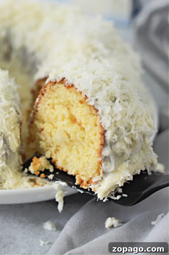 White Chocolate Coconut Bundt Bliss 2 Lush White Chocolate Coconut Bundt Cake, freshly baked and ready to be glazed.