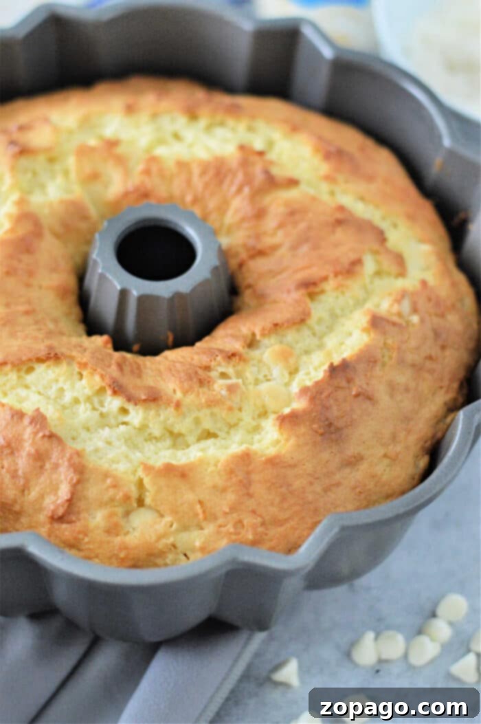 White Chocolate Coconut Bundt Bliss 4 Closeup of moist Cake Mix Coconut Bundt Cake, ready for frosting.