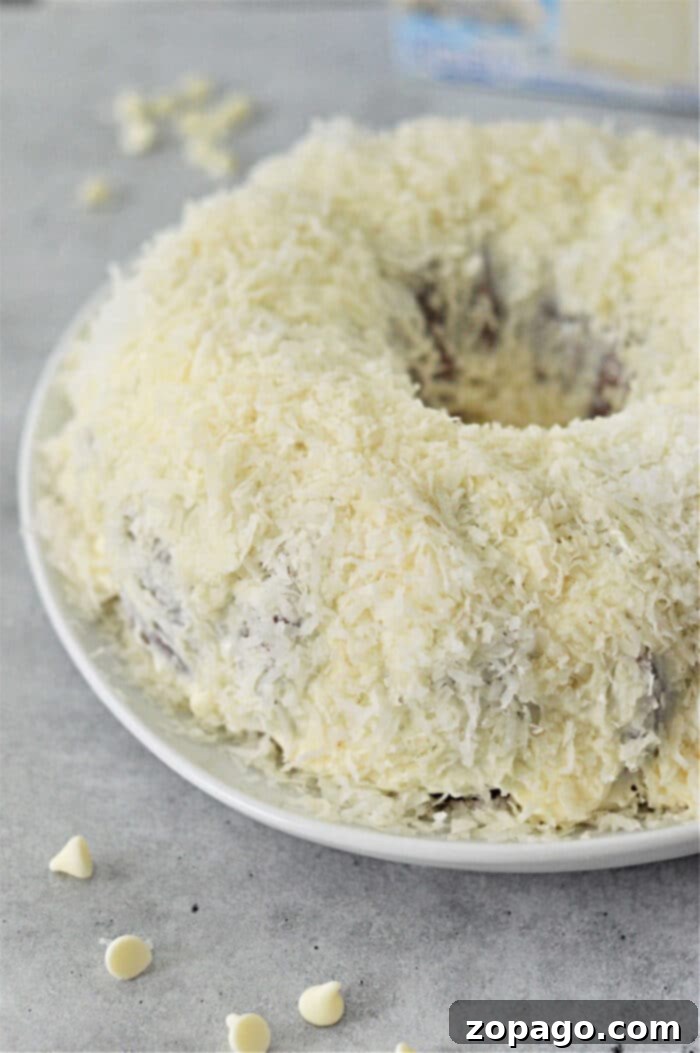 White Chocolate Coconut Bundt Bliss 5 The famous Tom Cruise Cake, a white chocolate coconut bundt cake, ready to be enjoyed.