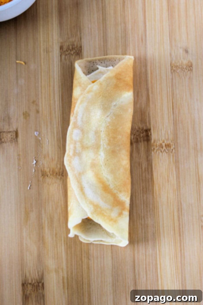 Classic Ham and Cheese Crepes 5 Chicken Crepes: Savory crepes filled with tender chicken and herbs, perfect for a light meal.