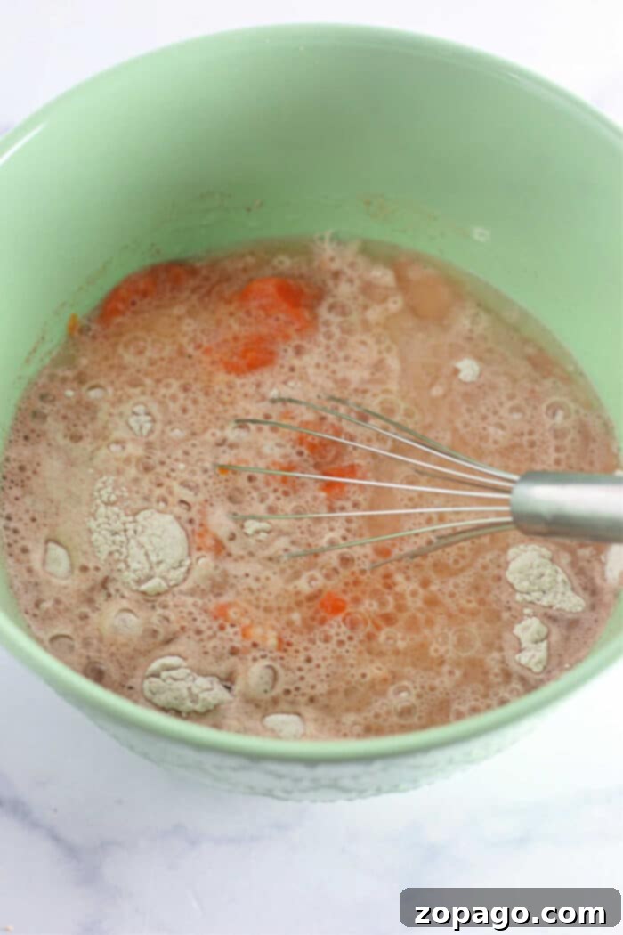 Autumn Spice Pumpkin Delight 4 A slice of moist no milk cake recipe on a white plate, showcasing its tender texture and delicious appearance.