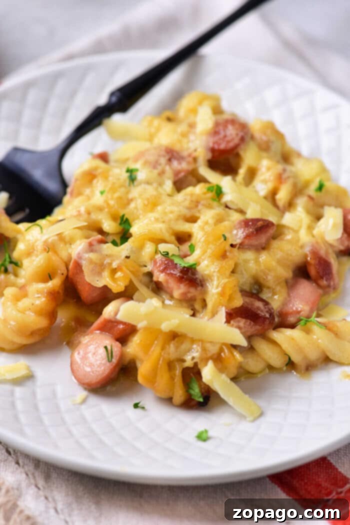 Cheesy Hot Dog Bake 6 Full baking dish of homemade hot dog casserole recipe, ready to serve