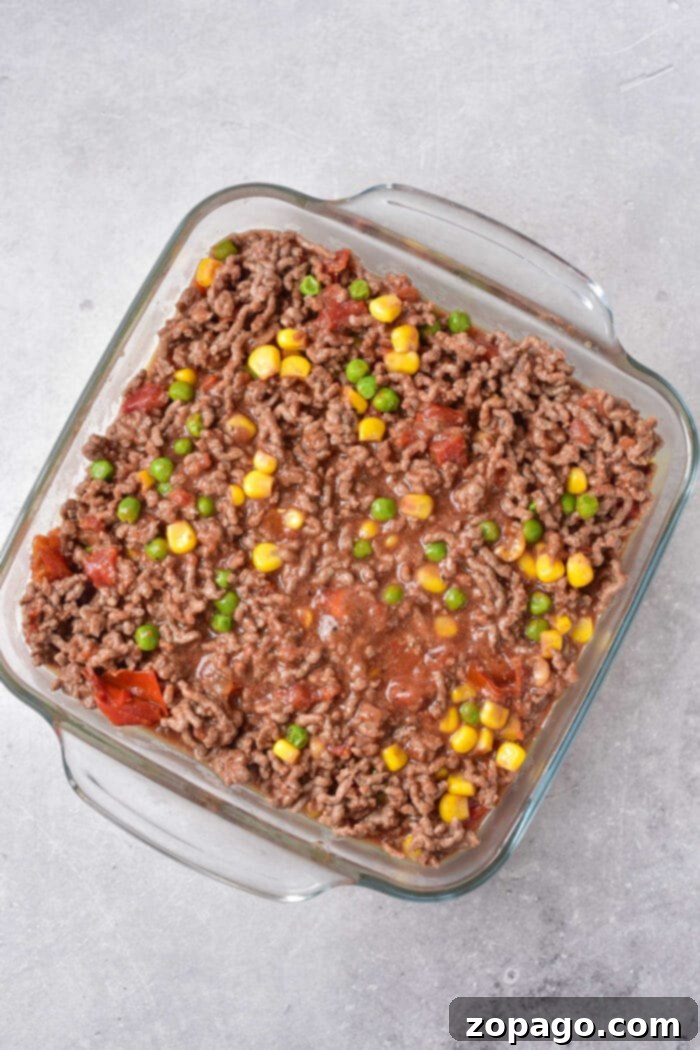 Castaway's Comfort Casserole 7 Shipwreck Casserole with Tomato Soup: A smooth and rich version of the classic dish.