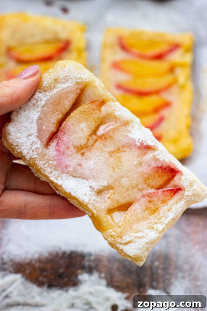 Puff Pastry Breakfast Ideas 5 A vibrant selection of Puff Pastry Breakfast Recipes, showcasing a variety of sweet and savory options on a rustic wooden board.
