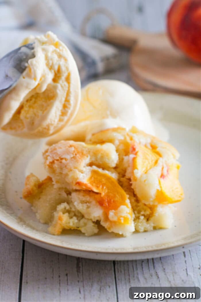 Fresh Peach Crumble 8 A delicious and moist cake cobbler, showcasing a rustic homemade dessert with fresh fruit.