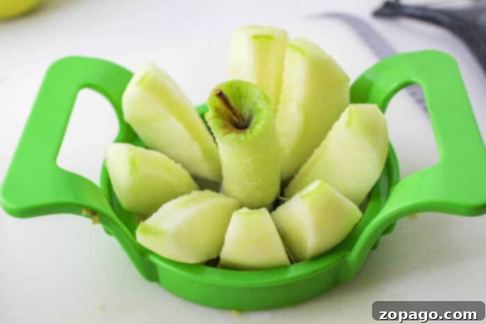 Warm Cinnamon Apple Slices 3 Close-up of freshly sliced apples, prepped for baking