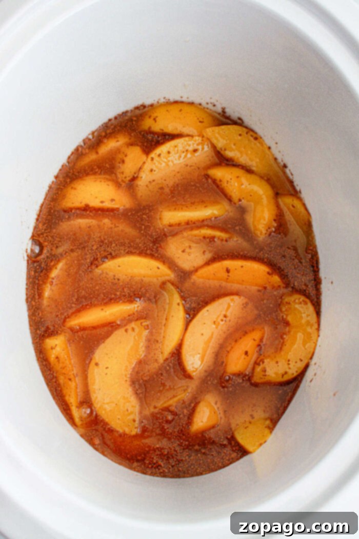 No-Fuss Cake Mix Crockpot Peach Cobbler 4 peach cobbler in a slow cooker