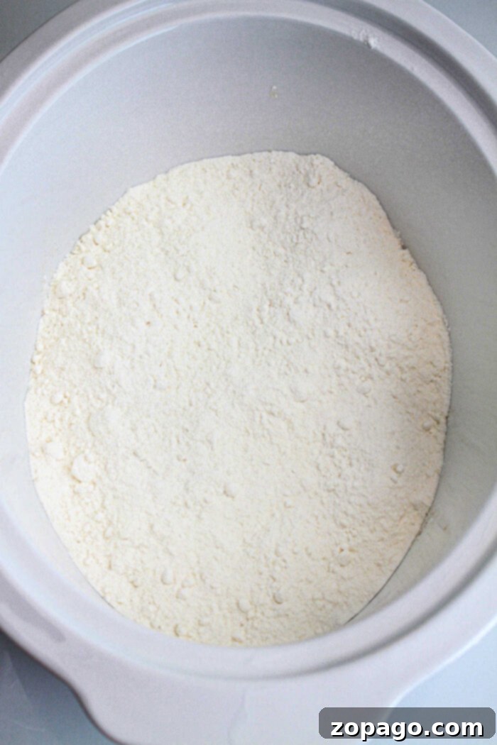 No-Fuss Cake Mix Crockpot Peach Cobbler 5 cake mix recipe in slow cooker