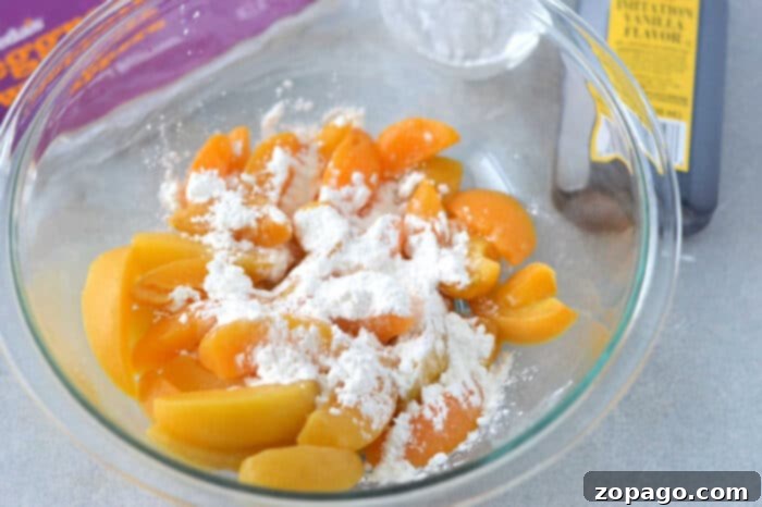 Golden Peach Dessert Rolls 4 Single peach cobbler egg roll with a bite taken out