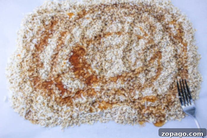 Whip Up Perfect Granola at Home 6 Preparing homemade granola on a baking sheet