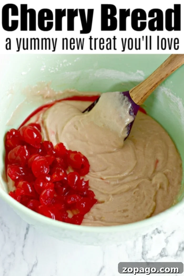 Homemade cherry bread for Valentine's Day. #cherrybread #cherries #sweetbread #cherryrecipes Close-up of freshly baked cherry bread with a pink hue