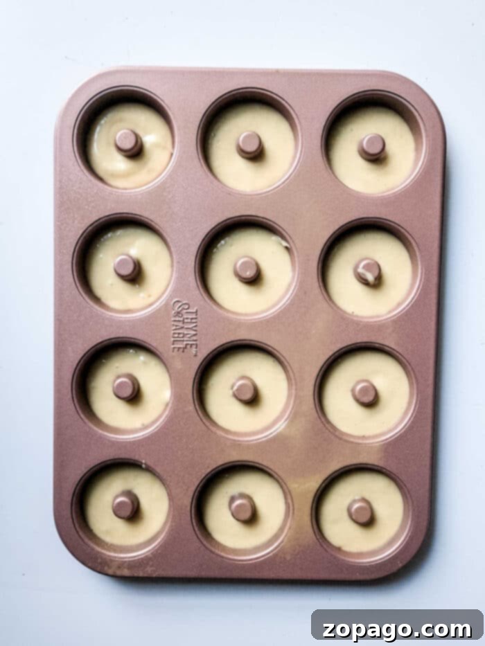 Whip Up Powdered Sugar Donuts 4 Baked Powdered Sugar Donuts stacked