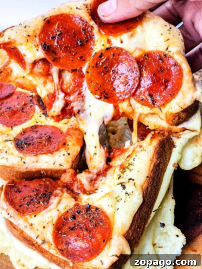 Pizza Toasties 6 Hearty Texas Toast Pizza, golden brown with melted cheese and pepperoni, baked to perfection.