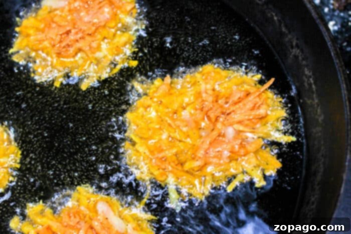 Golden Sweet Potato Latkes 6 Latkes with Sweet Potatoes presented beautifully on a platter