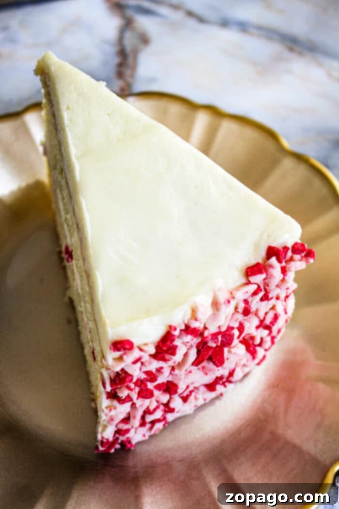Ultimate Peppermint Bliss Cake 6 A festive Candy Cane Cake adorned with crushed peppermints.