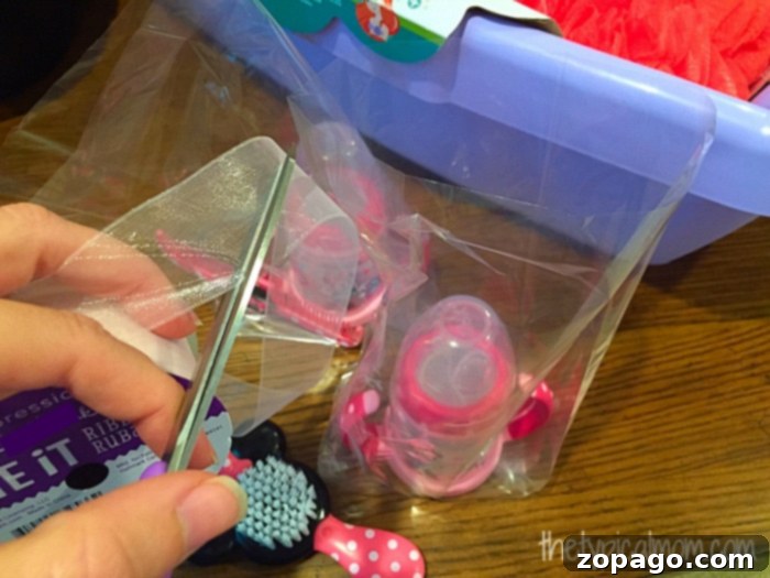 The Ultimate Baby Registry Guide 2 Mom changing baby's diaper with a Disney-themed gift
