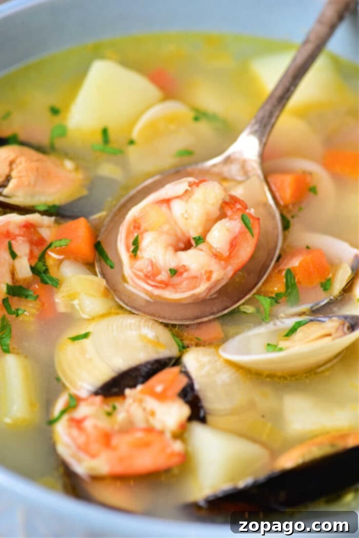 Shrimp and Corn Soup served in a rustic bowl