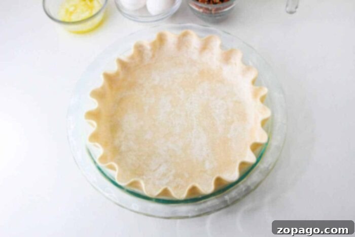 Flaky Sourdough Pie Crust 8 Wrapped pie dough disks in a freezer bag, ready for storage.
