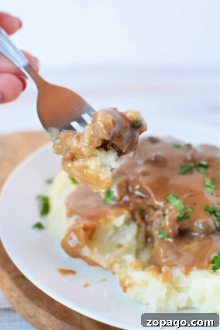 Effortless Crockpot Salisbury Steak 7 The finished Crockpot Salisbury Steak, showing a hearty and satisfying meal ready to be enjoyed.