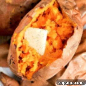Crockpot sweet potatoes, tender and fragrant, with a pat of butter melting on top, are surrounded by more perfectly cooked sweet potatoes.