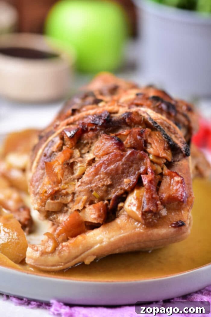 Savory Pork Pinwheels 8 Delicious Apple Stuffed Pork Roast on a Platter
