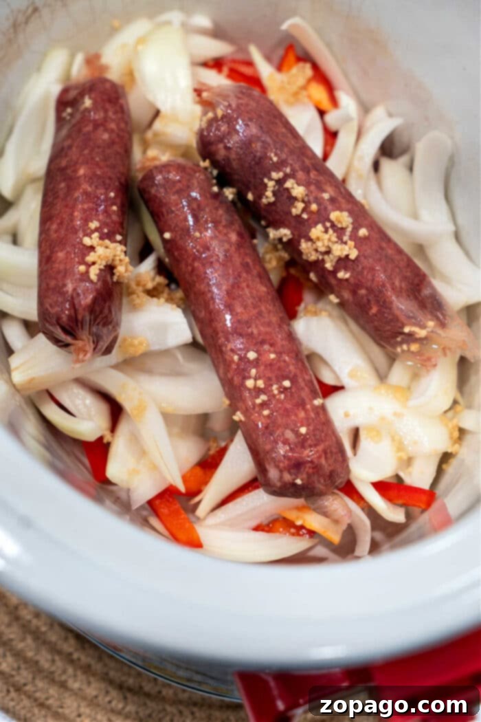 Perfect Venison Sausage at Home 5 Raw venison sausage patties ready for cooking in a skillet.