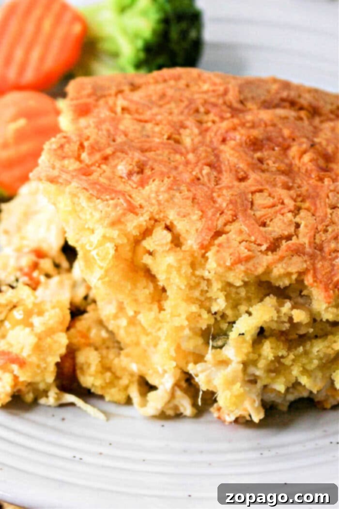 Quick Chicken Cornbread Delight 2 Delicious Chicken Cornbread Casserole with a golden-brown crust, ready to be served