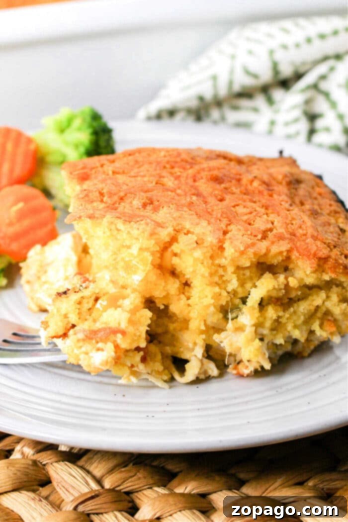 Quick Chicken Cornbread Delight 7 A large portion of the chicken cornbread casserole, showcasing its hearty and delicious layers