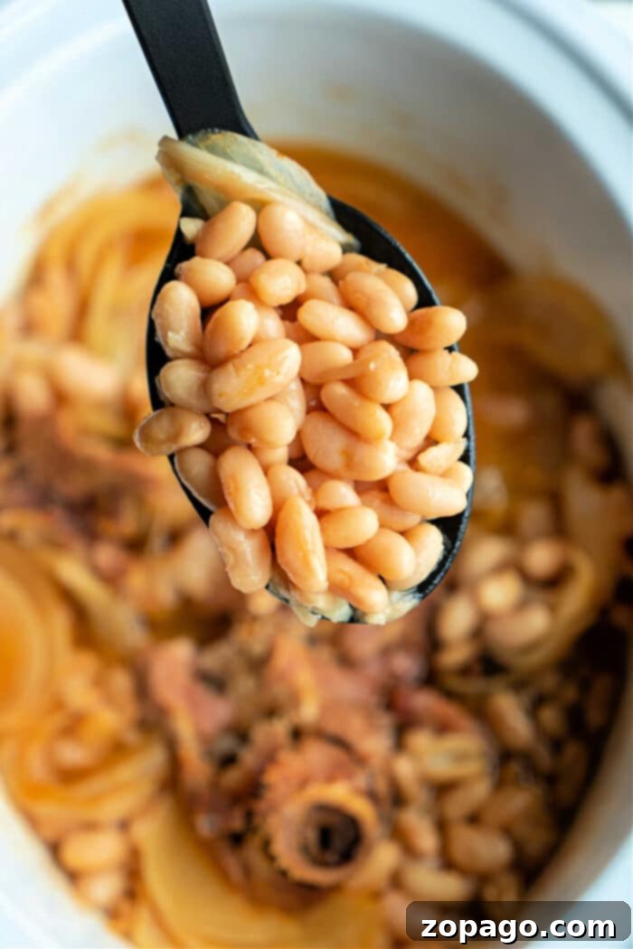 The Perfect Pairing 3 A hearty serving of Crockpot Beans and Cornbread, showcasing a comforting, slow-cooked meal.