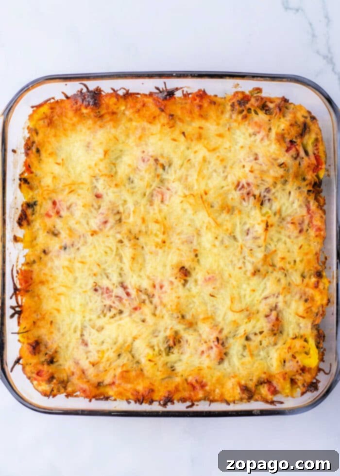 Spicy Rotel Sausage Dip 6 Sausage Rotel Dip with dippers on a rustic wooden board