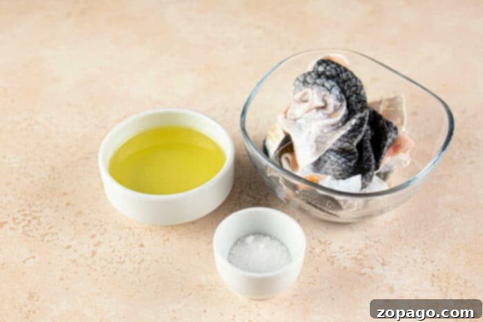 Crispy Fish Skin Delights 3 Expert guide on how to remove fish skin from Salmon fillet with a knife.