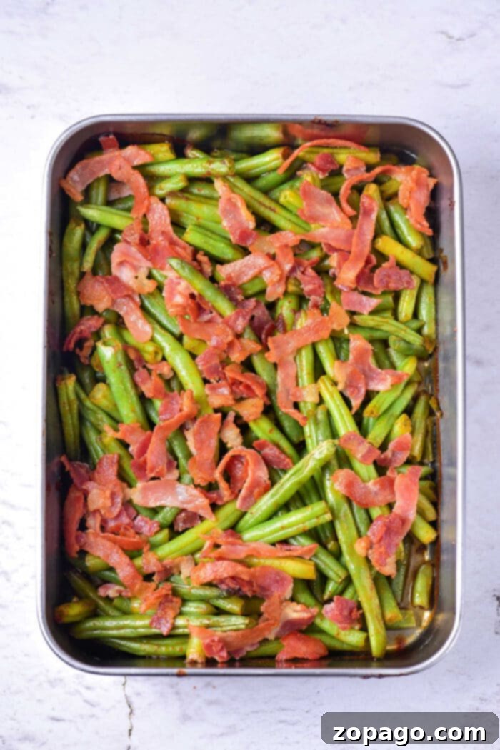 Irresistible Green Beans 6 Beautifully plated Crack Green Beans with crispy bacon and creamy sauce, ready to serve as a delectable side dish.