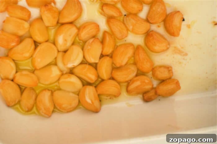 Homemade Garlic Oil: Simple Steps to Flavor 5 Homemade Garlic Oil Safely Stored in a Jar