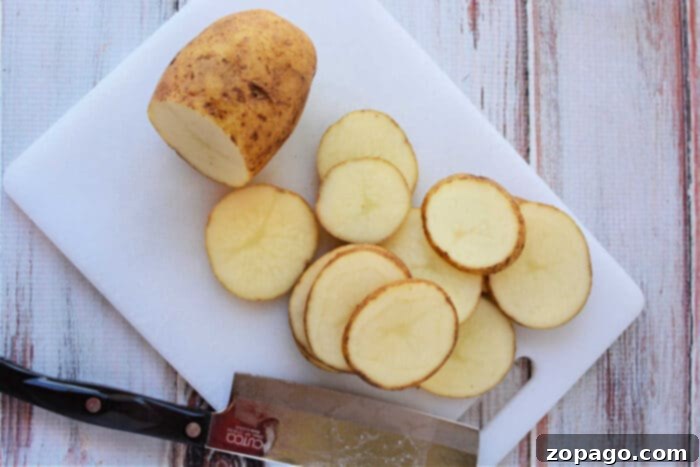 Crispy Oven Roasted Potato Slices 4 Macro shot of crispy sliced potatoes seasoned to perfection
