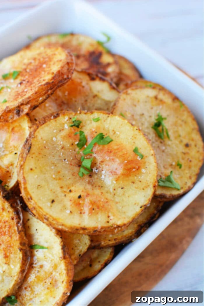 Crispy Oven Roasted Potato Slices 8 Serving of delectable oven baked sliced potatoes with herbs