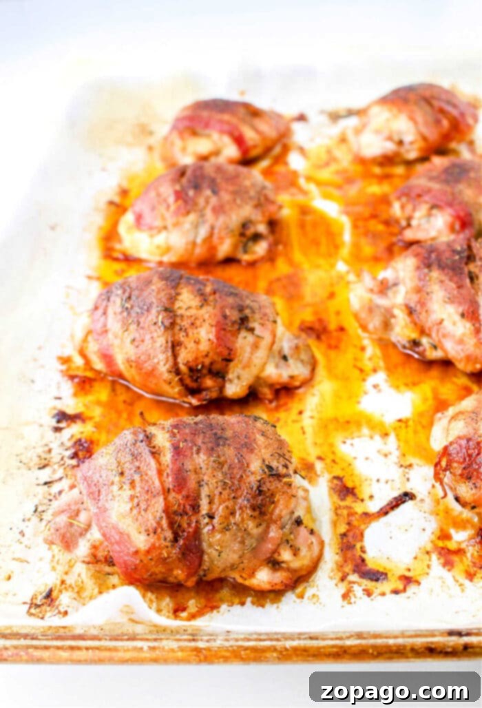 Crispy Bacon Wrapped Chicken Thighs 10 Bacon Wrapped Chicken in the Oven, golden brown and ready to serve.