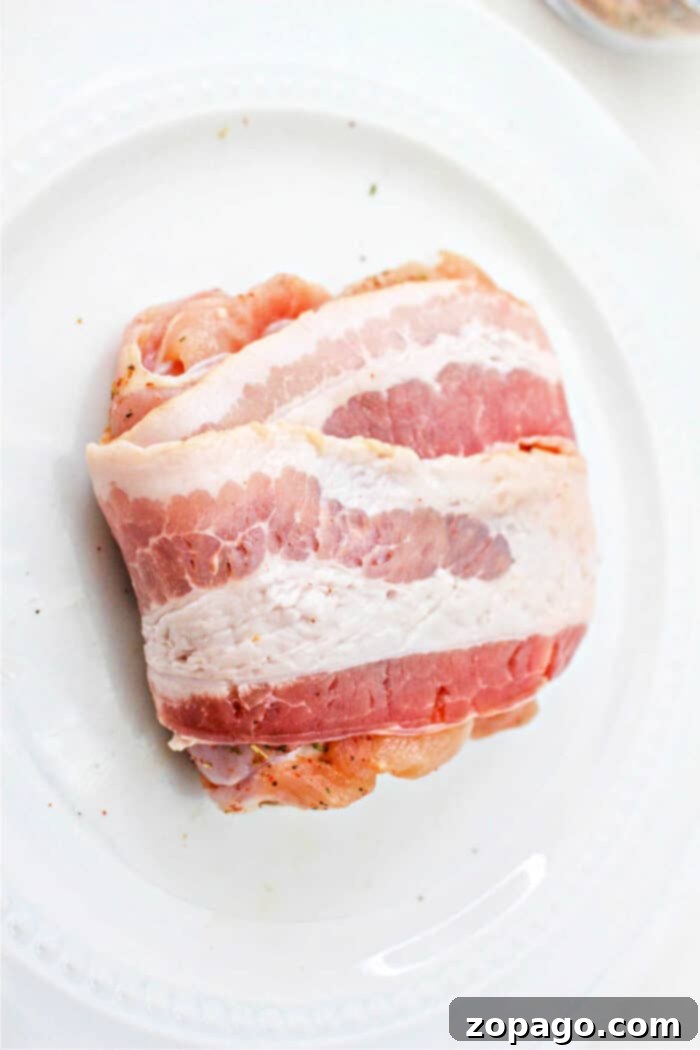 Crispy Bacon Wrapped Chicken Thighs 12 How Long to Cook Bacon Wrapped Chicken Thighs in the Oven, a detailed guide image.