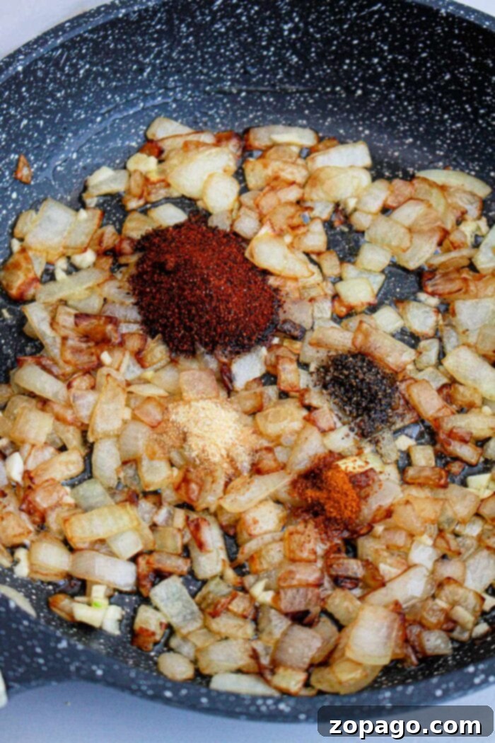 Unlock the Secret Popeyes Sauce Recipe 5 A close-up shot of rich, homemade barbecue sauce, ready for dipping or basting